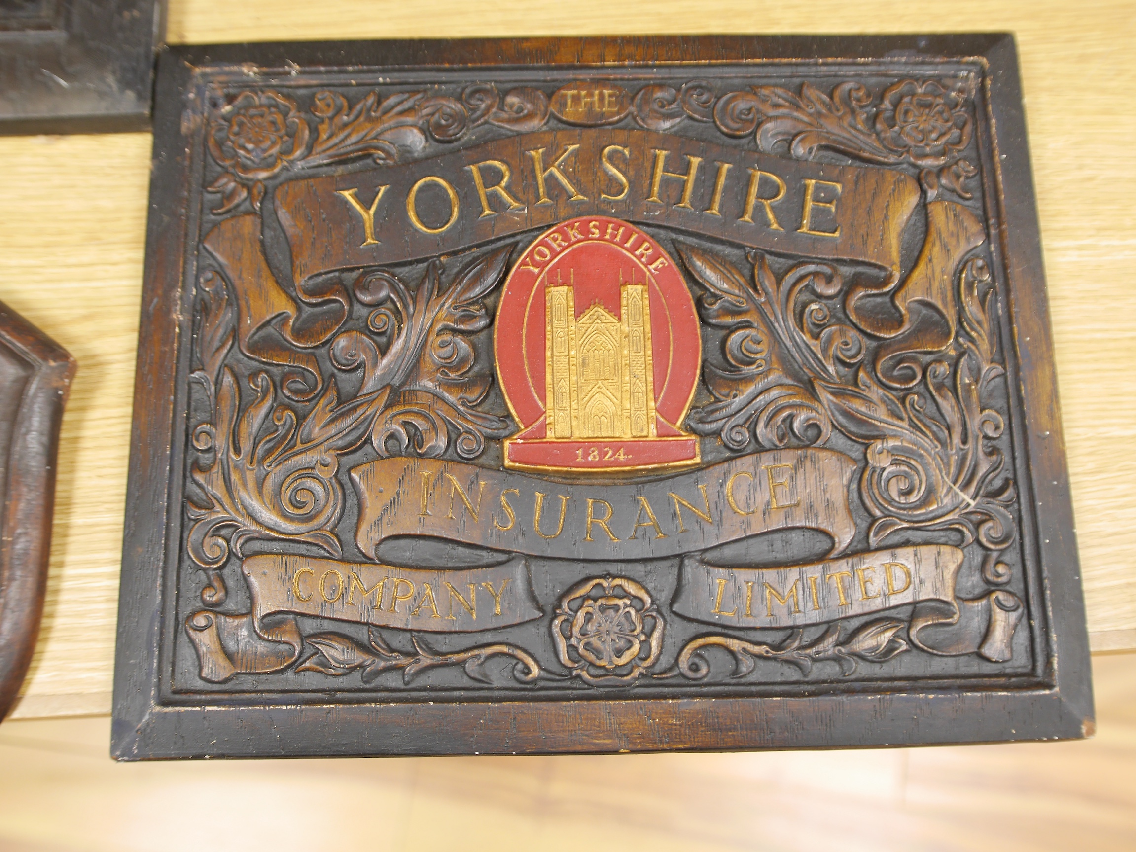 Seven insurance plaques to include The Yorkshire Insurance company and Alliance Insurance Company, largest 46cm high. Condition - varies